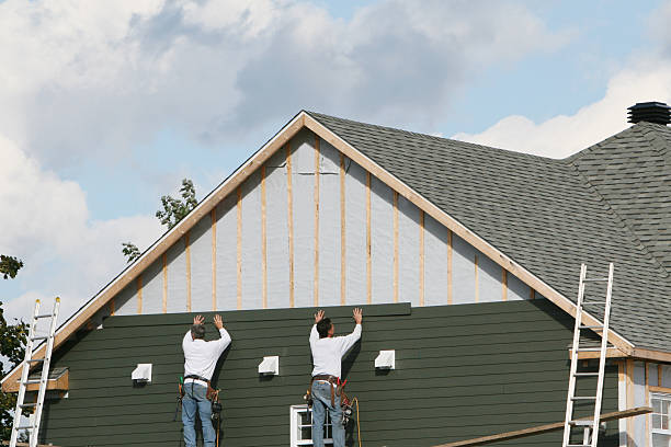 Professional Emergency Siding Repair technician working in Dayton, PA